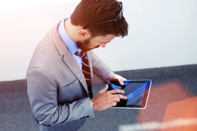 Man on iPad.jpg